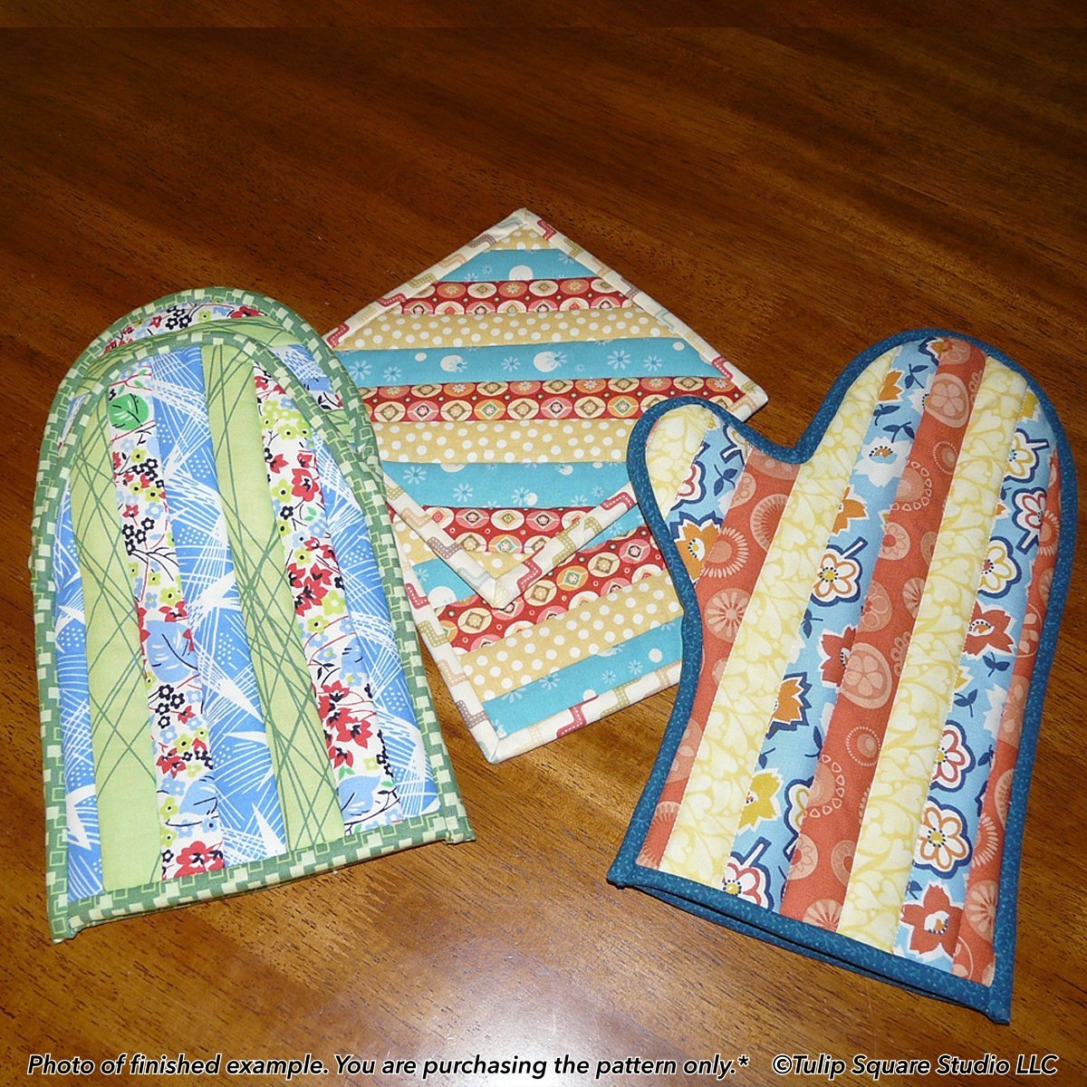 https://tulipsquare.com/wp-content/uploads/2021/06/506ovenmitts05_-tulip-square-quilt-patterns.jpg