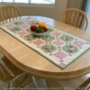 charming-squares-quilted-table-topper-tulip-square-patterns