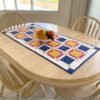 charming-squares-quilted-table-topper-tulip-square-patterns