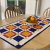 charming-squares-quilted-table-topper-tulip-square-patterns
