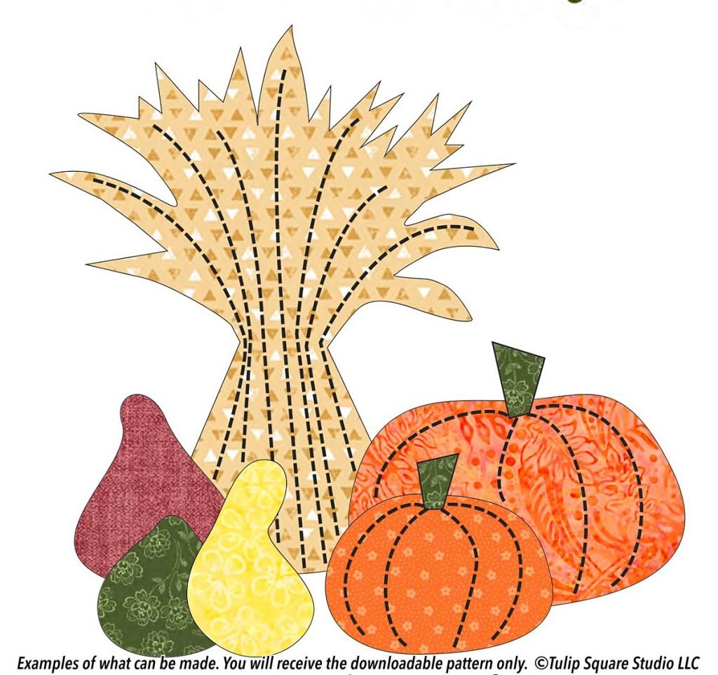 Sketch of stylized autumn wheat, pumpkins, and other squash. Filled with patterned fabrics in fall colors.