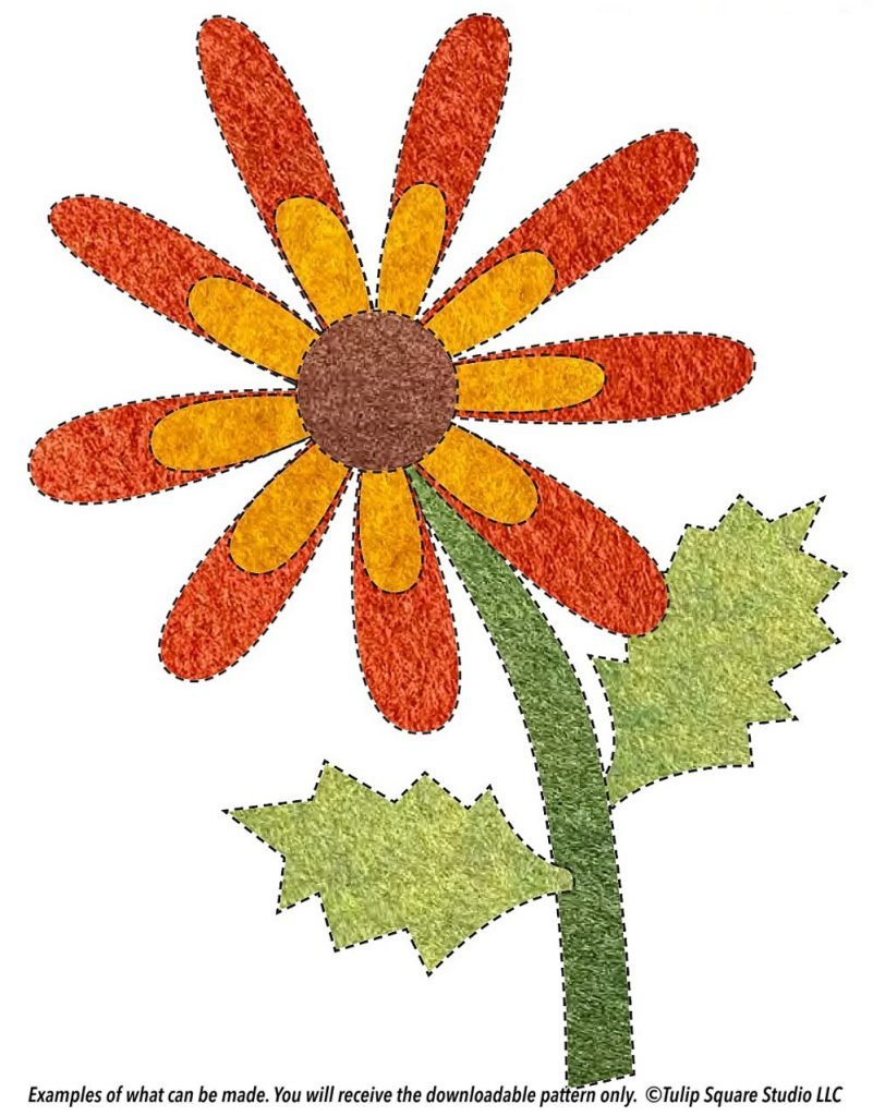 A two-toned orange flower with a brown center, on a stem with jagged leaves. Made of colored felt appliqué.